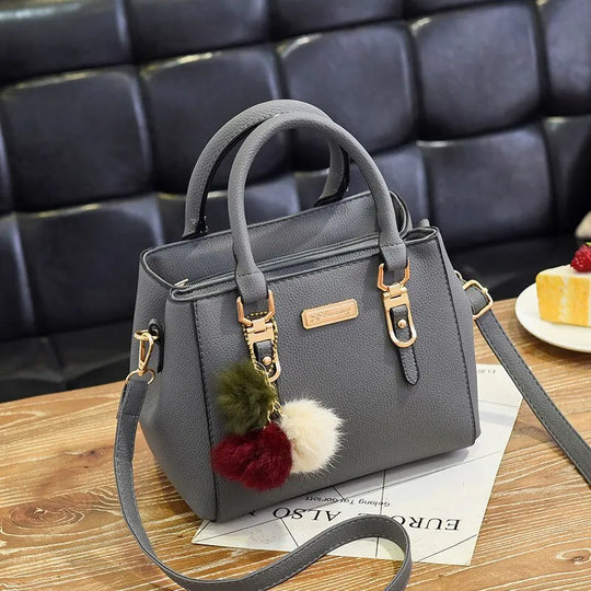 Damenhandtasche aus Leder mit Quaste